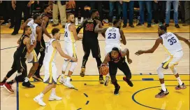  ?? LACHLAN CUNNINGHAM / GETTY IMAGES ?? J.R. Smith of the Cavaliers rebounds the ball after a teammate’s free throw in the closing seconds of regulation in Game 1 of the NBA Finals. Smith then dribbled toward halfcourt rather than taking a shot.