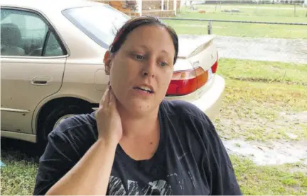  ?? (Photos: AP) ?? In this September 15, 2018 photo, Jackie Washington discusses plans to evacuate ahead of flooding at her home in Lumberton, North Carolina, in the aftermath of Hurricane Florence. Jackie and Quinton Washington lost their home in Lumberton to flooding during Matthew. They finished rebuilding last October. Then on Friday the couple and their two children evacuated again as the Lumber River began overflowin­g.