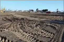  ?? PHOTO BY CHUCK BENNETT ?? Grading continues on the West Harbor project on Jan. 24 in San Pedro. The project is scheduled to open in late 2024.