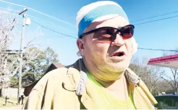  ?? (AP Photo/michael Goldberg) ?? George Drane, who survived a mass shooting Friday that claimed the lives of 6 people, speaks during an interview on Saturday, Feb. 18, 2023, in front of a convenienc­e store where the shootings began in Arkabutla, Miss. Drane’s girlfriend, Debra Crum, was the ex-wife of the shooting suspect, Richard Dale Crum.