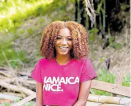  ?? ?? Pretty in pink, Adams’ shirt says it best: Jamaica Nice.