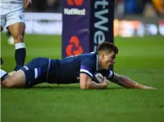  ?? (Getty ) ?? Huw Jones scores his first try