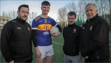  ?? Photo by Joe Hanley ?? Management of Tralee CBS senior football team Mike Tim O’Sullivan, Tim McMahon and Nellie O’Sullivan having a chat with team captain Sean Quilter at training ahead of this weekend’s Corn Ui Mhuirí final