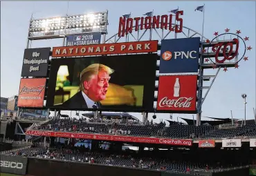  ?? ALEX WONG / GETTY IMAGES ?? President Donald Trump speaks via a video message Thursday during the 56th annual Congressio­nal Baseball Game for Charity at the National Park in Washington, D.C. The game was played as scheduled after House Majority Whip Rep. Steve Scalise,...