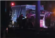  ?? NHAT V. MEYER — FILE PHOTO ?? Police surround a UPS truck during a standoff on North First Street and Trimble Road in San Jose on Feb. 14.