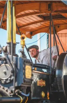  ??  ?? The driver of a vintage steam tractor intently watches the road ahead during the London to Brighton Historic Commercial Vehicle Run Nikon D4S, 70-200mm, 1/1250sec at f/2.8, ISO 200