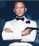  ??  ?? Iconic: Bond in white dinner jacket