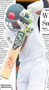  ?? AFP ?? Asad Shafiq’s fighting knock was ended by a Mitchell Starc short delivery.