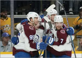  ?? MARK HUMPHREY - THE ASSOCIATED PRESS ?? Colorado Avalanche players celebrate after a goal by Valeri Nichushkin (13) during the third period in Game 4of an NHL hockey first-round playoff series against the Nashville Predators Monday, May 9, 2022, in Nashville, Tenn. The Avalanche won 5-3 to sweep the series 4-0.