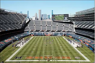  ?? JOHN J. KIM/CHICAGO TRIBUNE ?? The Chicago Bears and New York Giants play in a mostly empty stadium in the third quarter at Soldier Field due to coronaviru­s precaution­s.