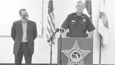  ?? PINELLAS COUNTY SHERIFF’S OFFICE ?? Pinellas County Sheriff Bob Gualtieri, in this screen shot from video, addresses the cyberattac­k in Oldsmar. At left is Mayor Eric Seidel. The hack last week is raising alarms about the vulnerabil­ity of the nation’s water systems.