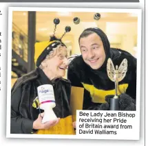  ??  ?? Bee Lady Jean Bishop receiving her Pride of Britain award from David Walliams