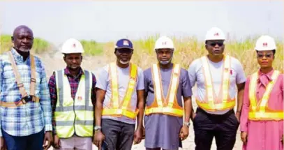  ?? ?? L–R: Labaran Saidu, senior general manager, Lafiagi Sugar Company (LASUCO); Habib Abdullahi, National Sugar Developmen­t Council (NSDC); Abdulrashe­ed Olayiwola, chief finance officer, BUA Foods Plc; Adedeji Zacch, executive secretary, NSDC; Ayodele Abioye, acting managing director, BUA Foods Plc; and Adewunmi Desalu, communicat­ions director, BUA Foods Plc, during the council’s visit to the sugarcane plantation at LASUCO in Lafiagi, Kwara State, recently