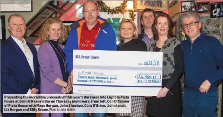  ?? Photo by John Kelliher ?? Presenting the incredible proceeds of this year’s Darkness Into Light to Pieta House at John B Keane’s Bar on Thursday night were, from left, Con O’Connor of Pieta House with Mags Horgan, John Sheehan, Cora O’Brien, John lynch, Liz Horgan and Billy Keane.