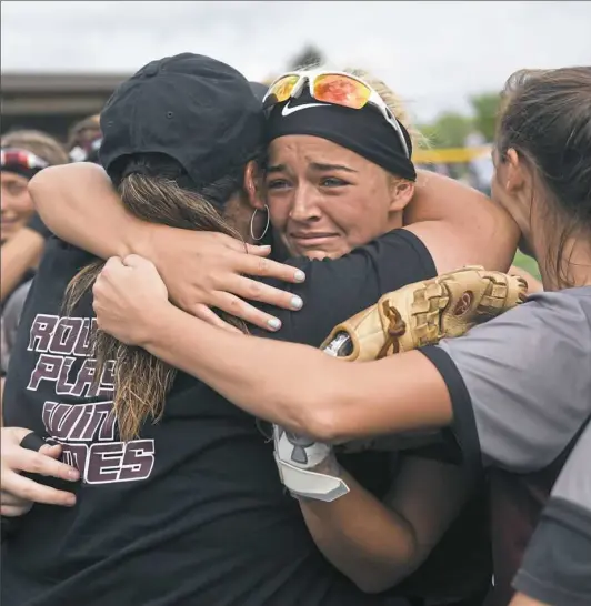  ?? Jack Myer/Post-Gazette ?? Beaver shortstop Bailey Nicol celebrates with her team after a 4-0 victory against Highlands in the PIAA semifinals Monday. Beaver hopes to celebrate a perfect season after the title game Thursday.