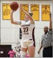  ?? BILL UHRICH — READING EAGLE ?? Gov. Mifflin’s Taylor Koenig, who finished with 22 points, hits a 3-pointer during the Mustangs’ win over Reading High on Thursday.