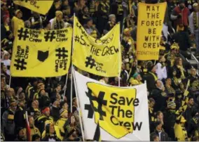  ?? JAY LAPRETE — THE ASSOCIATED PRESS FILE ?? In this file photo, Columbus Crew fans show their support for the team before the start of their MLS Eastern Conference semifinal soccer match against New York City FC in Columbus, Ohio. The owner of the Crew has been pushing for months to move his team to Austin. But picking up and relocating from Ohio hasn’t been easy.