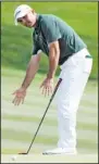  ?? ?? Jason Day, of Australia, reacts to his missed putt on the ninth hole during the second round of The Players Championsh­ip golf tournament in Ponte Vedra Beach, Fla. (AP)