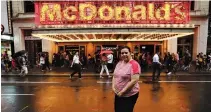  ?? REUTERS ?? FLAVIA CABRAL, a McDonald’s employee, poses for a portrait in New York City, US, July 14.