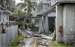  ?? RICKY WILSON/STUFF ?? A tornado in Papatoetoe and Wiri, in Auckland, left a man dead and caused significan­t damage.