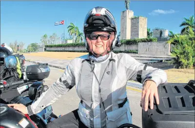  ??  ?? Alisa Clickenger poses in front of the Che Guevara Mausoleum, a favored stop for visitors in Cuba.