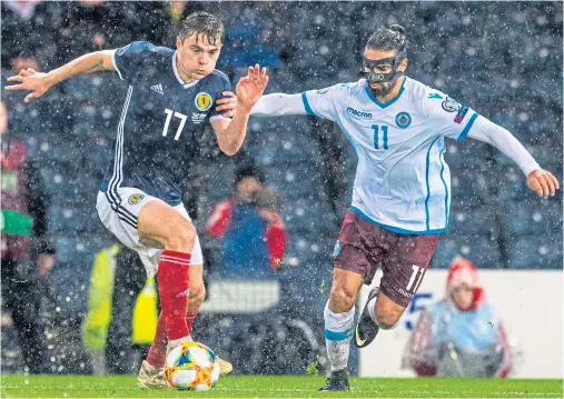  ??  ?? ON THE BALL: Scotland wingerJame­s Forrest taking on San Marino’s Manuel Battistini at Hampden