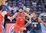  ?? —AFP ?? DALLAS: Joel Embiid #21 of the Philadelph­ia 76ers looks on during the game against the Dallas Mavericks on Monday at the American Airlines Center in Dallas, Texas.