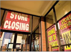  ?? Dreamstime ?? Signs of the times: Retailers have closed more than 250 million square feet in the last two years.