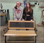  ?? PHOTO PROVIDED ?? Catskill students Madison Jones and Ingris Martinez with the bench they restored.