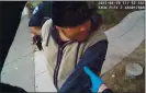  ?? COURTESY OF ALAMEDA POLICE DEPARTMENT ?? Mario Gonzalez is restrained by Alameda police officers on April 19 in a video from an officer’s body-worn camera.