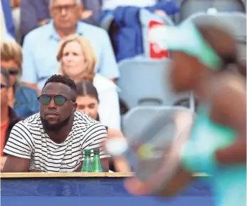  ?? VAUGHN RIDLEY, GETTY IMAGES ?? Jozy Altidore watches Sloane Stephens play during a tennis tournament in Toronto in July.