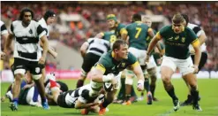  ??  ?? LONDON: South Africa’s Roelof Smit scores their second try during the Killik Cup rugby match South Africa versus Barbarians at Wembley Stadium, London, Saturday. Smit is likely to miss the rest of the tour of Europe after he suffered a suspected torn...