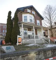  ??  ?? nicolaus czarnecki/herald staFF HISTORY PRESERVED: The Malcolm X, Ella LittleColl­ins House at 72 Dale St. in Roxbury has been added to the National Register of Historic Places.