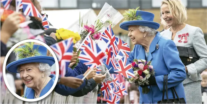  ?? Pictures: GETTY / PA ?? Looking resplenden­t in cornflower blue, a smiling Queen is handed bouquets by schoolchil­dren who turned out to greet her at a veterans’ housing project in south London yesterday