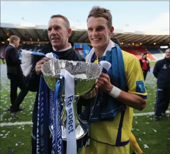  ?? ?? Kilmarnock celebrate after lifiting the League Cup in 2012