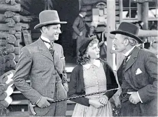  ??  ?? Andy Clyde, right, with Melvyn Douglas and Barbara Stanwyck in the 1935 film Annie Oakley. Picture: RKO Radio Pictures.