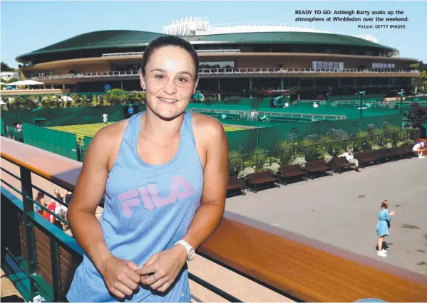  ?? Picture: GETTY IMAGES ?? READY TO GO: Ashleigh Barty soaks up the atmosphere at Wimbledon over the weekend.