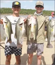  ?? Submitted Photo ?? Jacques Adams (left) and Christian Scott (right) show their winning catch from the Matt Place Memorial Tournament on Saturday.