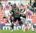  ?? ?? HEAD BOY: Stoke’s Phil Jagielka heads the ball towards goal