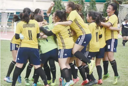  ?? SUNSTAR FILE ?? CAN THEY DO IT AGAIN? Members of the St. Theresa’s College team celebrate after winning the Girls 18 title of the SunStar Cup. This year, STC will be aiming to keep their 16-Under and 18-Under titles of the annual tournament.