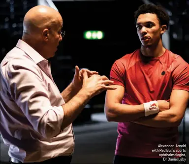  ??  ?? Alexander-Arnold with Red Bull’s sports ophthalmol­ogist, Dr Daniel Laby
