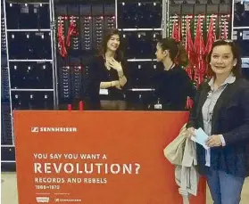  ??  ?? The author’s wife Menchu in front of the headsets booth at the “Revolution” exhibit