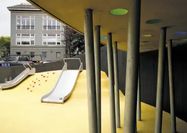  ?? Photos by Paul Chinn / The Chronicle ?? The remodeled Mountain Lake playground in the Presidio reopens after a $3.15 million face-lift that took two years to complete. The metal poles set into concrete are intended to look like a grove of trees.