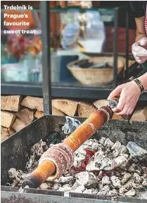  ??  ?? Trdelník is Prague’s favourite sweet treat