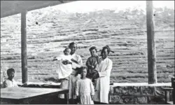  ?? PROVIDED TO CHINA DAILY ?? A 1912 photo taken at the house of missionary A. W. Billing in Guling, which was known as Kuliang at the time. Billing’s children are at center stage.