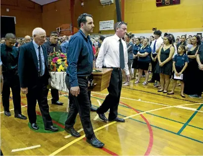  ?? PHOTOS: DOMINICO ZAPATA/STUFF ?? More than a thousand people gathered to remember Casey Walker, at the Morrinsvil­le Event Centre yesterday.