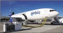  ??  ?? The Orbis “Flying Eye Hospital” makes a stop for supplies.