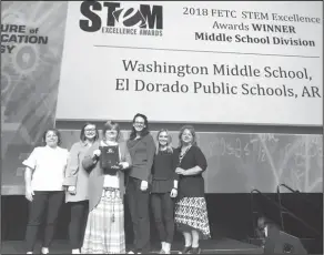  ??  ?? Award: Washington Middle School won the FETC STEM Excellence Middle School Division Award. Accepting the award, from left, are Karla Long, Chelsey Turner, Jody Vines, Hannah Young, Catherine Kozubski and Marsha Snell.