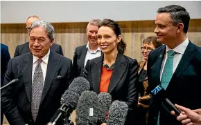  ?? ABIGAIL DOUGHERTY/STUFF ?? Deputy Prime Minister Winston Peters, Prime Minister Jacinda Ardern and Green Party leader James Shaw stand in “unity”.