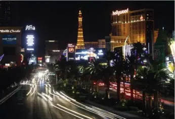  ?? STEVE MARCUS/THE ASSOCIATED PRESS FILE PHOTO ?? Over New Year’s, the Las Vegas Strip was blanketed with marijuana smoke, Rosie DiManno writes — something she hopes to avoid once the drug is legalized in Canada.